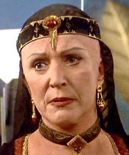 WHAT'S WITH THE BALD CHICK???